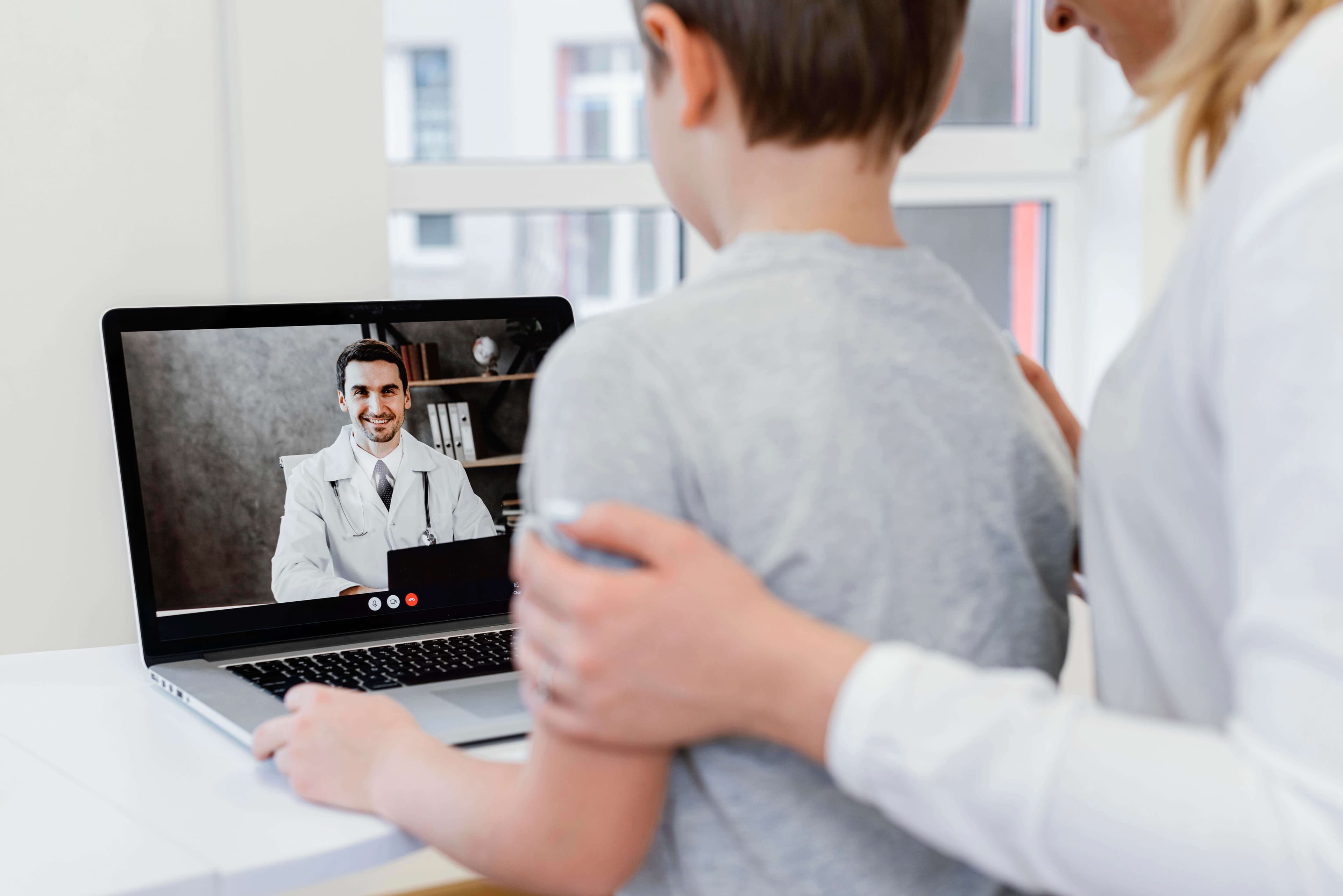 Patient talking with a doctor during an online consultation