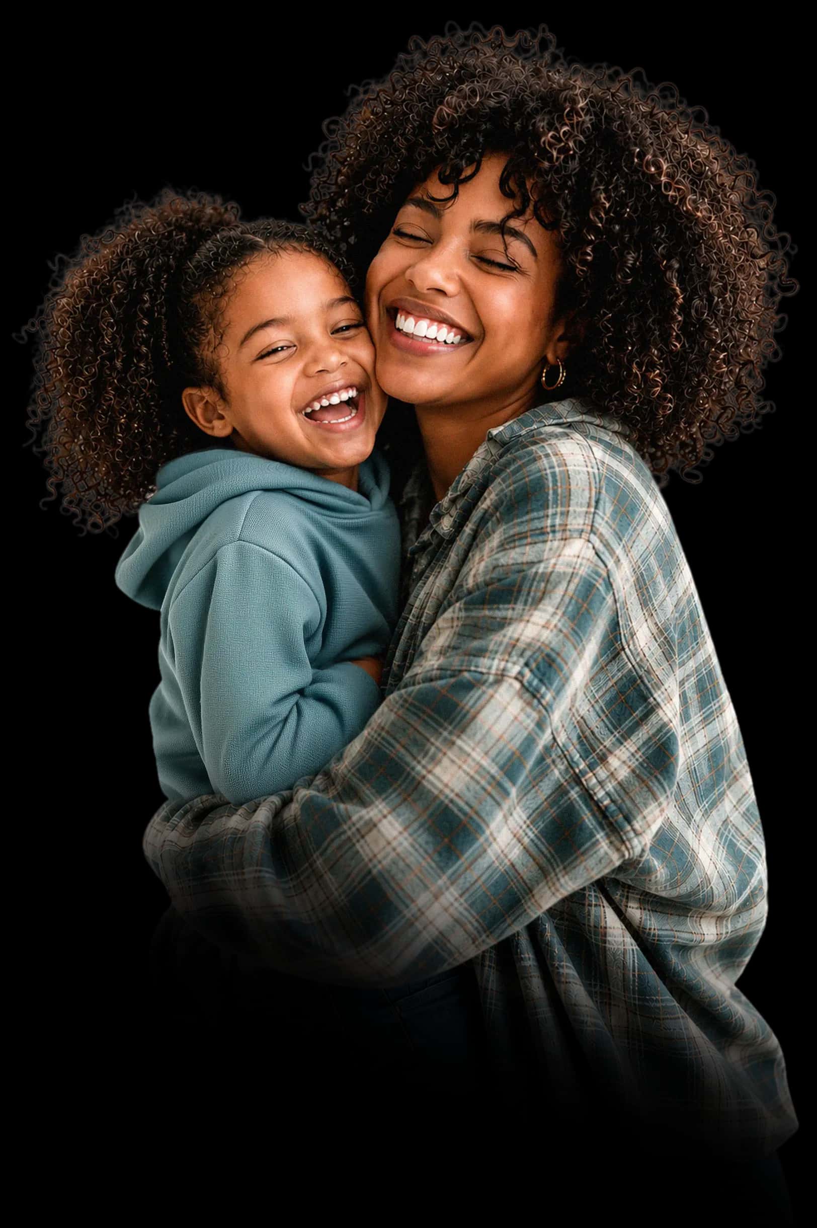 A mother and her daughter hugging and laughing
